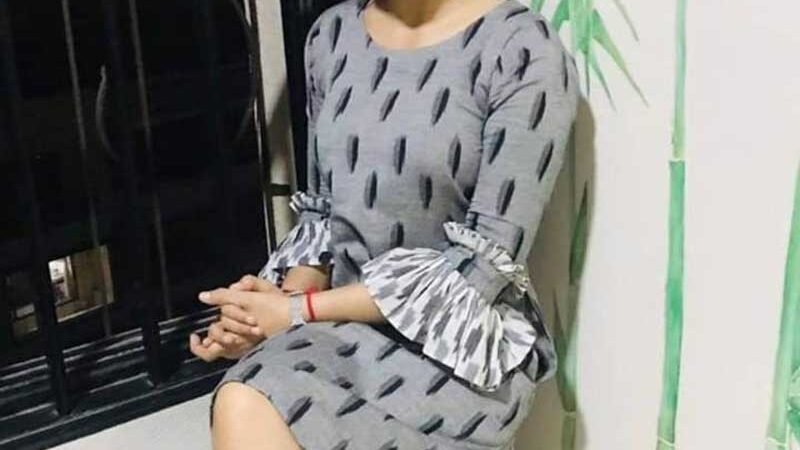 cute girl sitting beside window